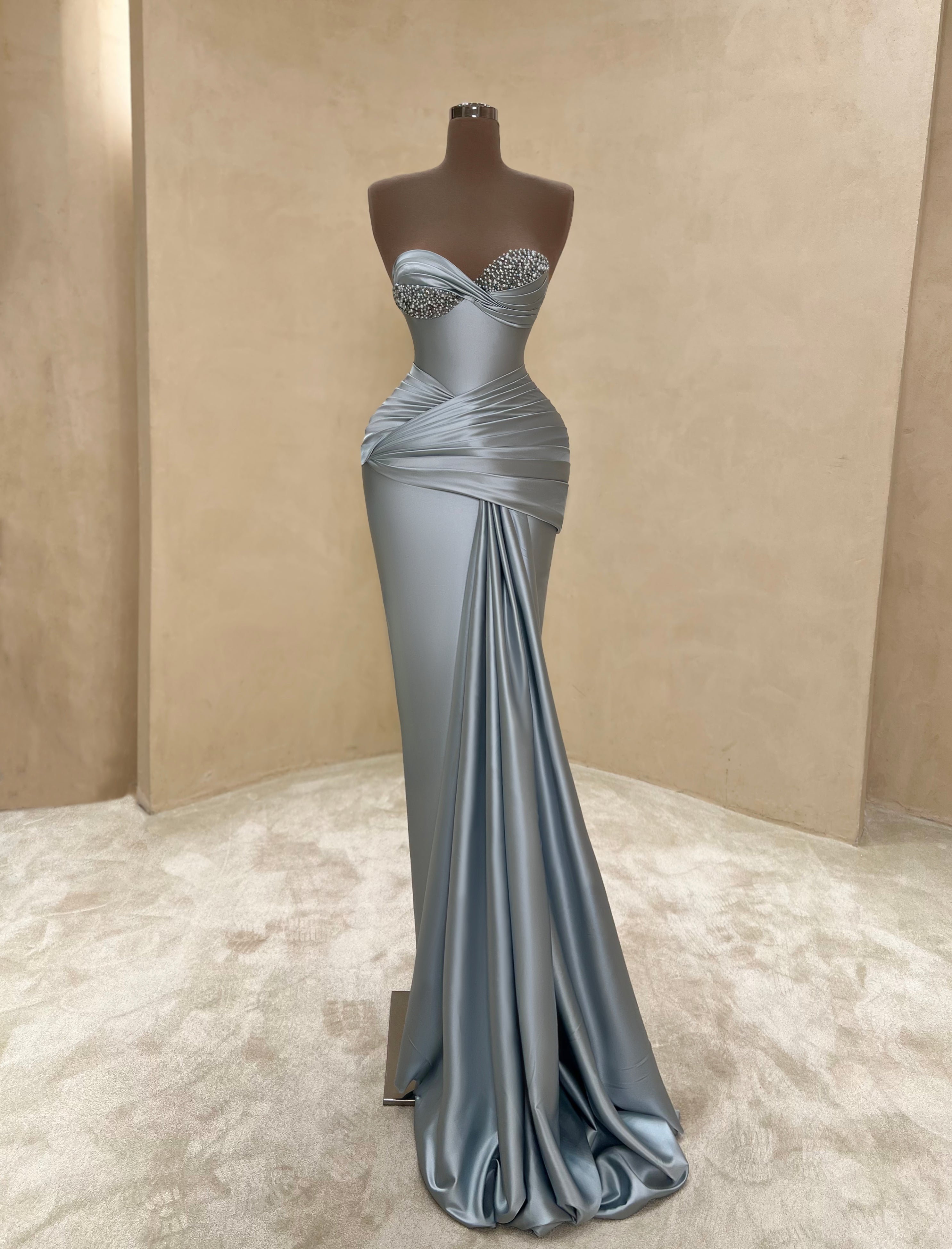 Silver Halter Ruched Metallic Gown with Slit – VALDRIN SAHITI Silver Halter Ruched Metallic Gown with Slit – VALDRIN SAHITI